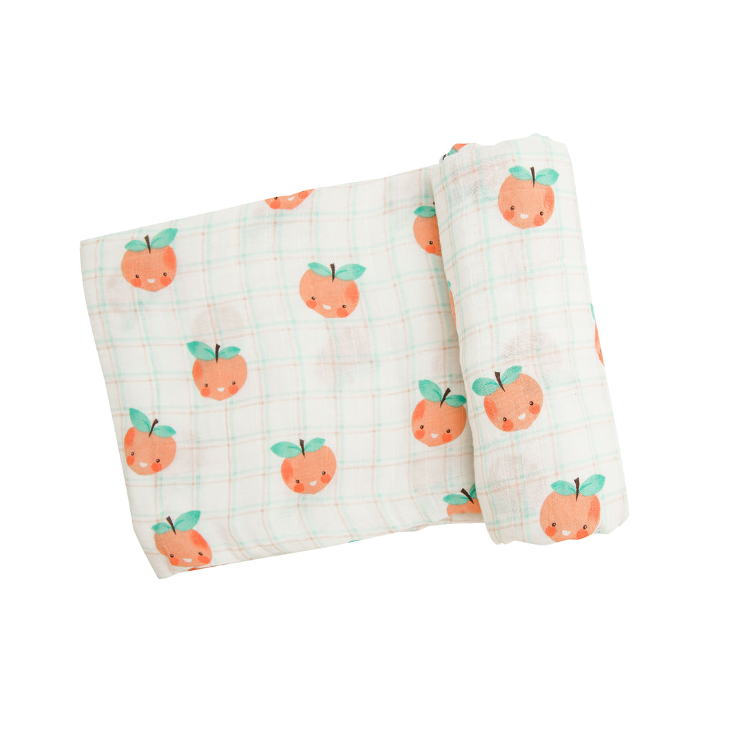 Plaid Peaches Swaddle Blanket